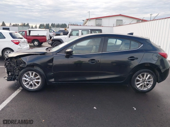 2016 Mazda Mazda3 i Grand Touring with VIN JM1BM1N74G1279692, listed as a IAAI auction lot 41164751 with 93,535 mi miles. Bid and sale history available at carsss.com. Image 14.