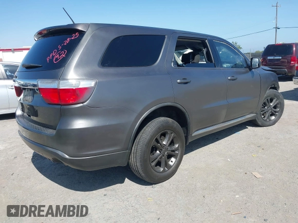 2013 Dodge Durango SXT with VIN 1C4RDJAG5DC697005, listed as a IAAI auction lot 42396872 with 115,046 mi miles and . Bid and sale history available at DreamBid. Image 4.