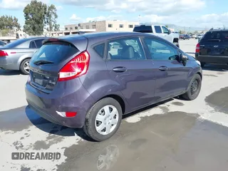 2013 Ford Fiesta SE with VIN 3FADP4EJ8DM221179, listed as a IAAI auction lot 41958070 with 197,454 mi miles. Bid and sale history available at carsss.com. Image 4.