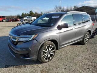 2020 Honda Pilot Touring 8-Passenger with VIN 5FNYF5H92LB024047, listed as a Copart auction lot 41630695 with 74,067 mi miles and Salvage Title. Bid and sale history available at DreamBid. Image 1.