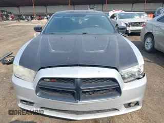 2013 Dodge Charger Police with VIN 2C3CDXAT2DH549840, listed as a IAAI auction lot 42495236 with 151,257 mi miles and . Bid and sale history available at DreamBid. Image 6.