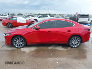 2023 Mazda 3 S Preferred with VIN 3MZBPACM2PM355071, listed as a IAAI auction lot 41880149 with 40,669 mi miles and . Bid and sale history available at DreamBid. Image 14.
