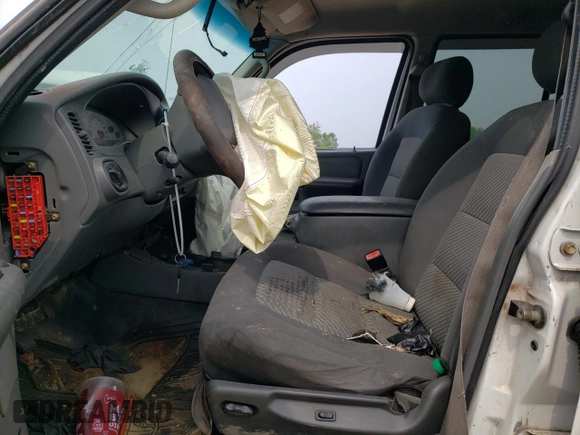 2005 Ford Explorer Sport Trac XLS with VIN 1FMZU77K75UB56611, listed as a Copart auction lot 60622925 with 157,063 mi miles and Salvage title. Bid and sale history available at DreamBid. Image 7.