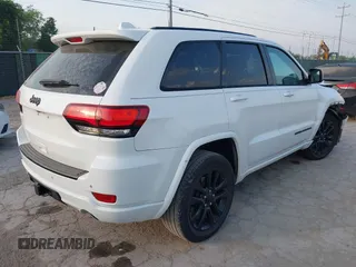 2017 Jeep Grand Cherokee Laredo with VIN 1C4RJEAG1HC720656, listed as a IAAI auction lot 42263500 with 184,239 mi miles and . Bid and sale history available at DreamBid. Image 4.