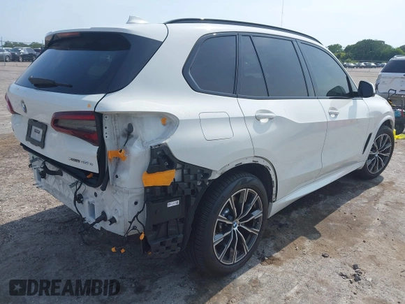 2021 BMW X5 xDrive45e with VIN 5UXTA6C08M9F38909, listed as a IAAI auction lot 42172536 with 71,741 mi miles and . Bid and sale history available at DreamBid. Image 4.