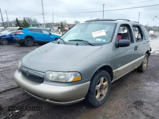 2000 Mercury Villager z VIN 4M2XV14T8YDJ21156, wystawiony jako IAAI lot #41733910 z przebiegiem 208 822 mil mil oraz . Historia ofert i sprzedaży dostępna na DreamBid. Obrazek 2.