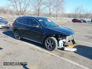 2018 BMW X1 xDrive28i with VIN WBXHT3C36J5F91110, listed as a IAAI auction lot 41757293 with 80,327 mi miles. Bid and sale history available at carsss.com. Image 1.
