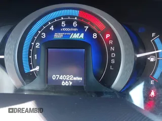 2010 Honda Insight LX with VIN JHMZE2H50AS019740, listed as a IAAI auction lot 41665527 with 74,022 mi miles and . Bid and sale history available at DreamBid. Image 7.