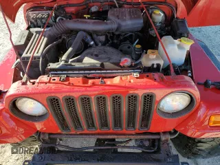 1999 Jeep Wrangler SE with VIN 1J4FY29P8XP483909, listed as a Copart auction lot 48679555 with 168,708 mi miles and Salvage title. Bid and sale history available at DreamBid. Image 11.