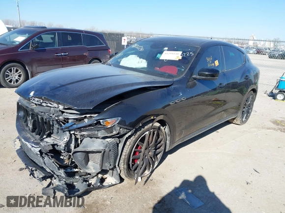 2022 Maserati Levante Modena S z VIN ZN661ZUM0NX400467, wystawiony jako IAAI lot #41294140 z przebiegiem 93 148 mil mil oraz . Historia ofert i sprzedaży dostępna na DreamBid. Obrazek 18.