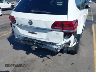 2019 Volkswagen Atlas SE z VIN 1V2WR2CA3KC503490, wystawiony jako IAAI lot #42168340 z przebiegiem 70 868 mil mil oraz . Historia ofert i sprzedaży dostępna na DreamBid. Obrazek 6.