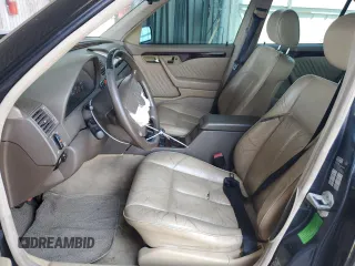 1996 Mercedes-Benz C with VIN WDBHA28E1TF402525, listed as a Copart auction lot 69050504 with 178,492 mi miles and Salvage Title. Bid and sale history available at carsss.com. Image 7.