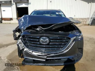 2022 Mazda CX-9 Touring Plus with VIN JM3TCBAY3N0609893, listed as a Copart auction lot 49701575 with 104,108 mi miles and Clean title. Bid and sale history available at DreamBid. Image 5.