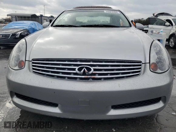 2005 Infiniti G35 Coupe with VIN JNKCV54E05M408692, listed as a Copart auction lot 79323394 with 54,617 mi miles and Salvage Title. Bid and sale history available at carsss.com. Image 5.
