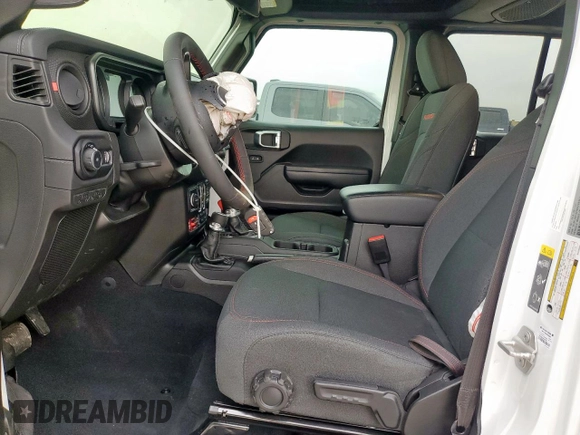 2024 Jeep Wrangler Rubicon with VIN 1C4PJXFG2RW266901, listed as a Copart auction lot 60641445 with 3,908 mi miles and Salvage title. Bid and sale history available at DreamBid. Image 7.