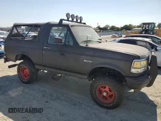 1993 Ford Bronco Custom with VIN 1FMEU15H0PLA22387, listed as a Copart auction lot 65433825 with Not provided miles and Clean title. Bid and sale history available at DreamBid. Image 4.