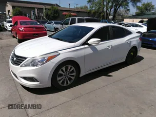 2014 Hyundai Azera with VIN KMHFG4JG8EA346609, listed as a IAAI auction lot 42010249 with 105,646 mi miles and . Bid and sale history available at DreamBid. Image 2.