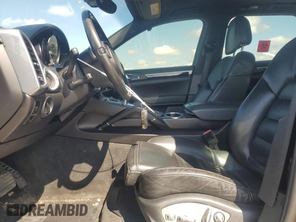 2011 Porsche Cayenne with VIN WP1AA2A28BLA04200, listed as a Copart auction lot 56824575 with 180,123 mi miles and Salvage title. Bid and sale history available at DreamBid. Image 7.