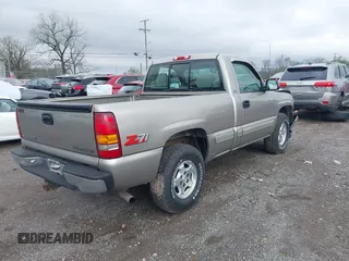 1999 Chevrolet Silverado 1500 LS with VIN 1GCEK14T3XZ161362, listed as a IAAI auction lot 41973905 with 153,845 mi miles. Bid and sale history available at carsss.com. Image 4.
