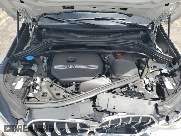 2023 BMW X1 xDrive28i z VIN WBX73EF02P5Y15293, wystawiony jako Copart lot #57629965 z przebiegiem 7 381 mil mil oraz Szkoda całkowita • Salvage title. Historia ofert i sprzedaży dostępna na DreamBid. Obrazek 12.