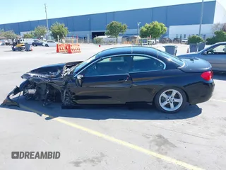 2015 BMW 4 Series 428i z VIN WBA3V7C53FP772066, wystawiony jako IAAI lot #42837150 z przebiegiem Nie podano mil oraz . Historia ofert i sprzedaży dostępna na DreamBid. Obrazek 15.