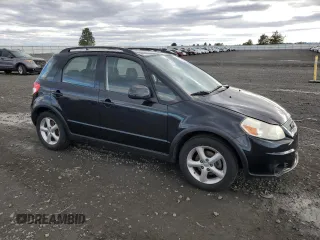 2009 Suzuki SX4 with VIN JS2YB413095103261, listed as a Copart auction lot 79321024 with 96,587 mi miles and Salvage Title. Bid and sale history available at carsss.com. Image 4.