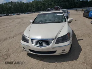 2005 Acura RL z VIN JH4KB16535C006603, wystawiony jako Copart lot #57969935 z przebiegiem 176 336 mil mil oraz Czysty tytuł • Clean title. Historia ofert i sprzedaży dostępna na DreamBid. Obrazek 5.