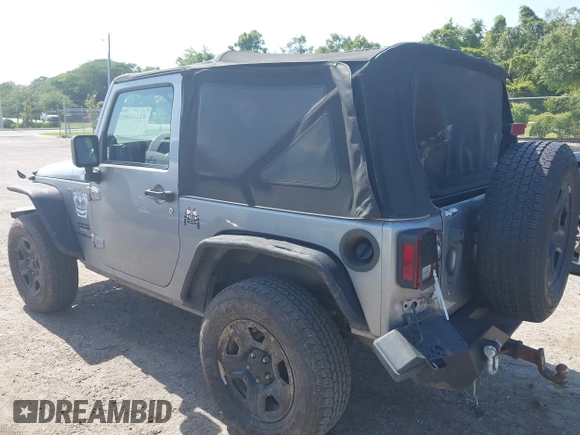 2014 Jeep Wrangler Sport with VIN 1C4AJWAG0EL126459, listed as a IAAI auction lot 42286803 with 179,025 mi miles and . Bid and sale history available at DreamBid. Image 3.