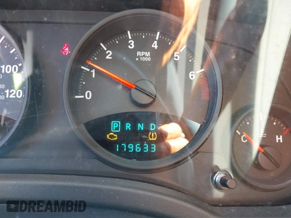 2011 Jeep Compass with VIN 1J4NT1FA4BD208116, listed as a IAAI auction lot 41604552 with 179,633 mi miles. Bid and sale history available at carsss.com. Image 7.