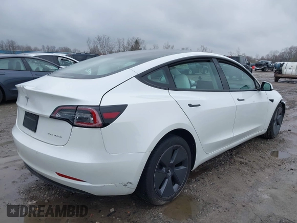 2022 Tesla Model 3 Long Range with VIN 5YJ3E1EB6NF272009, listed as a IAAI auction lot 41984154 with 12,651 mi miles and . Bid and sale history available at DreamBid. Image 4.