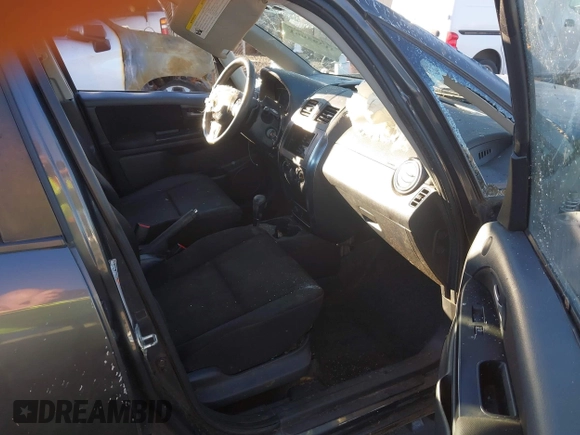 2010 Suzuki SX4 with VIN JS2YC5A40A6300053, listed as a IAAI auction lot 41392061 with 114,863 mi miles and . Bid and sale history available at DreamBid. Image 5.