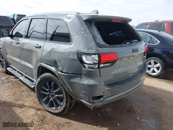2021 Jeep Grand Cherokee Laredo X with VIN 1C4RJEAG5MC824738, listed as a IAAI auction lot 41580995 with 57,923 mi miles. Bid and sale history available at carsss.com. Image 18.