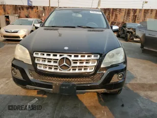 2009 Mercedes-Benz M 3.5L with VIN 4JGBB56E49A525018, listed as a Copart auction lot 41614175 with 154,428 mi miles and Salvage Title. Bid and sale history available at carsss.com. Image 5.
