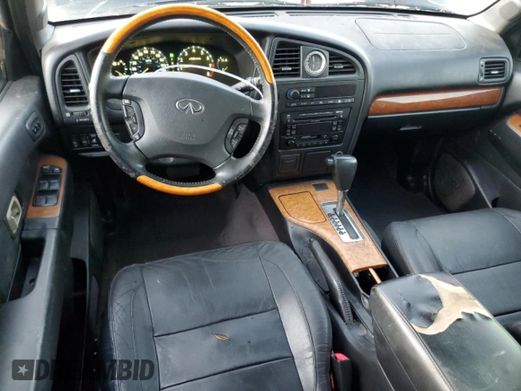 2002 Infiniti QX4 with VIN JNRDR09X92W210247, listed as a Copart auction lot 84913164 with 160,938 mi miles and Salvage Title. Bid and sale history available at DreamBid. Image 8.
