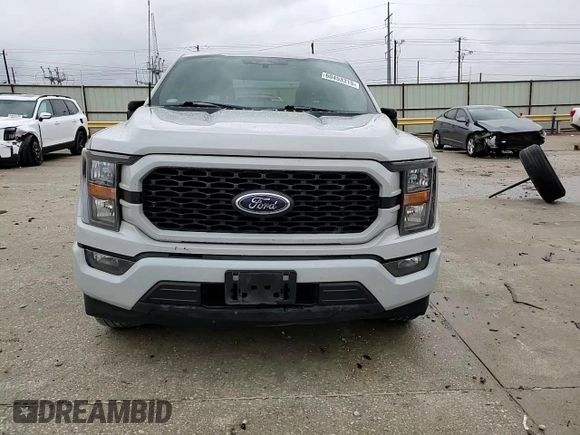 2023 Ford F-150 XL with VIN 1FTEW1CP8PKD11810, listed as a Copart auction lot 60453315 with 83,312 mi miles and Salvage title. Bid and sale history available at DreamBid. Image 14.
