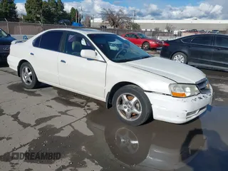2002 Acura TL w/Navigation with VIN 19UUA56722A019597, listed as a IAAI auction lot 41534165 with 263,064 mi miles. Bid and sale history available at carsss.com. Image 1.