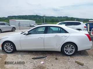 2019 Cadillac CTS RWD with VIN 1G6AP5SXXK0109823, listed as a IAAI auction lot 42401514 with 64,635 mi miles and . Bid and sale history available at DreamBid. Image 14.