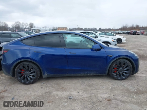 2020 Tesla Model Y Long Range with VIN 5YJYGDEF0LF000380, listed as a IAAI auction lot 41867489 with 66,294 mi miles and . Bid and sale history available at DreamBid. Image 13.