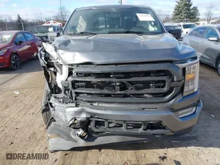2023 Ford F-150 XL with VIN 1FTEW1EPXPFB48020, listed as a IAAI auction lot 41219055 with 7,405 mi miles. Bid and sale history available at carsss.com. Image 6.