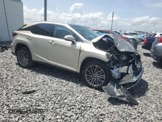 2021 Lexus RX 350 with VIN 2T2JZMAA9MC183642, listed as a Copart auction lot 61768375 with 37,629 mi miles and Salvage title. Bid and sale history available at DreamBid. Image 4.