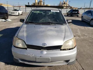 2002 Toyota ECHO with VIN JTDBT123025027203, listed as a Copart auction lot 70723424 with 187,299 mi miles and Salvage Title. Bid and sale history available at DreamBid. Image 5.