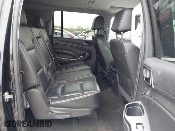 2016 Chevrolet Suburban LT z VIN 1GNSKHKC7GR315884, wystawiony jako IAAI lot #41977108 z przebiegiem 138 902 mil mil oraz . Historia ofert i sprzedaży dostępna na DreamBid. Obrazek 8.