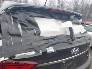 2020 Hyundai Santa Fe SE with VIN 5NMS2CAD8LH258275, listed as a IAAI auction lot 41912687 with 80,467 mi miles and . Bid and sale history available at DreamBid. Image 12.