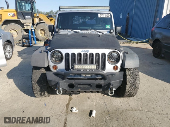 2009 Jeep Wrangler X with VIN 1J4FA24119L729880, listed as a Copart auction lot 54576155 with 173,959 mi miles and Clean Title. Bid and sale history available at DreamBid. Image 5.