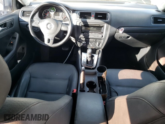 2012 Volkswagen Jetta SE with VIN 3VWDX7AJ4CM077031, listed as a Copart auction lot 67516484 with 201,024 mi miles and Salvage title. Bid and sale history available at DreamBid. Image 8.