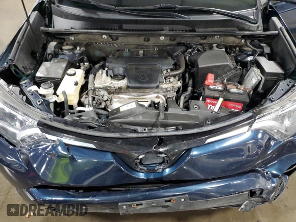 2017 Toyota RAV4 LE with VIN JTMBFREV6HJ165878, listed as a Copart auction lot 58940845 with 120,897 mi miles and Salvage title. Bid and sale history available at DreamBid. Image 12.