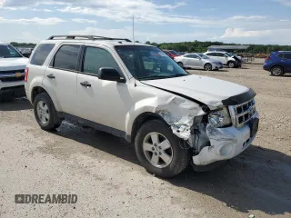 2012 Ford Escape XLT z VIN 1FMCU9DG2CKB54288, wystawiony jako Copart lot #61569655 z przebiegiem 169 899 mil mil oraz Szkoda całkowita • Salvage title. Historia ofert i sprzedaży dostępna na DreamBid. Obrazek 4.