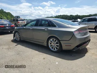 2016 Lincoln MKZ z VIN 3LN6L2J96GR601039, wystawiony jako Copart lot #63209425 z przebiegiem 151 629 mil mil oraz Szkoda całkowita • Salvage title. Historia ofert i sprzedaży dostępna na DreamBid. Obrazek 2.
