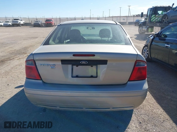 2007 Ford Focus S z VIN 1FAFP34N47W298854, wystawiony jako IAAI lot #41814627 z przebiegiem 126 781 mil mil oraz . Historia ofert i sprzedaży dostępna na DreamBid. Obrazek 17.