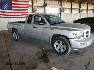 2011 Dodge Dakota with VIN 1D7RE3BP8BS510730, listed as a Copart auction lot 60486815 with 66,539 mi miles and Salvage title. Bid and sale history available at DreamBid. Image 4.